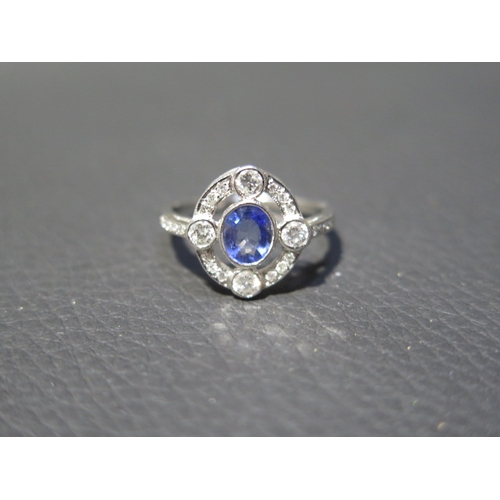 116 - A platinum Art Deco style sapphire and diamond ring - head size approx 14mm x 13mm with diamond shou... 