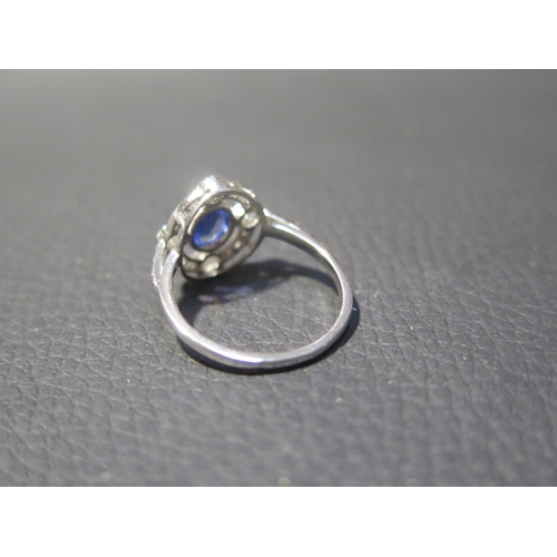 116 - A platinum Art Deco style sapphire and diamond ring - head size approx 14mm x 13mm with diamond shou... 