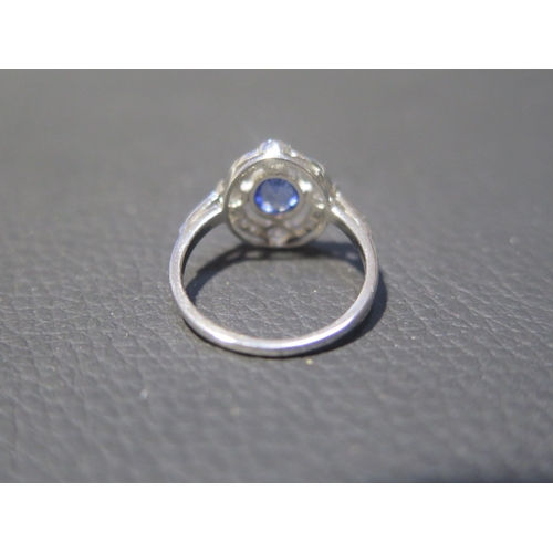 116 - A platinum Art Deco style sapphire and diamond ring - head size approx 14mm x 13mm with diamond shou... 