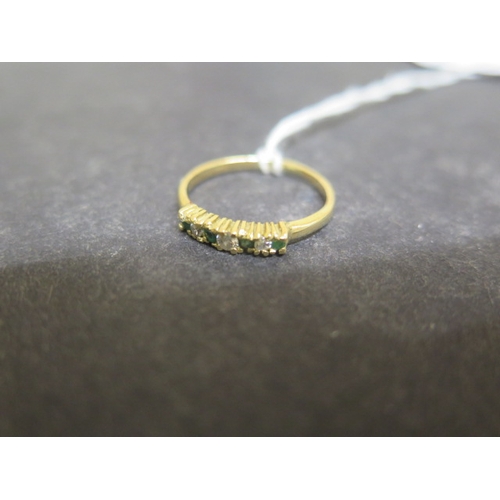 142 - An 18ct yellow gold emerald and diamond seven stone ring size O - weight approx 2 grams