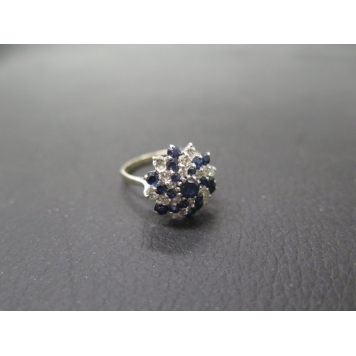 164 - An 18ct white gold diamond and sapphire cluster ring size N - weight approx 5.1 grams