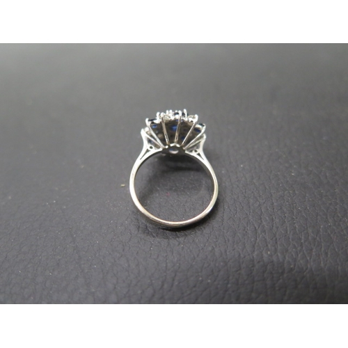 164 - An 18ct white gold diamond and sapphire cluster ring size N - weight approx 5.1 grams