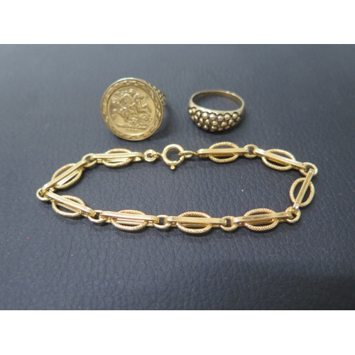 168 - Two 9ct gold rings - approx weight 7.7 grams - and a 9ct gold bracelet - approx weight 5.6 grams