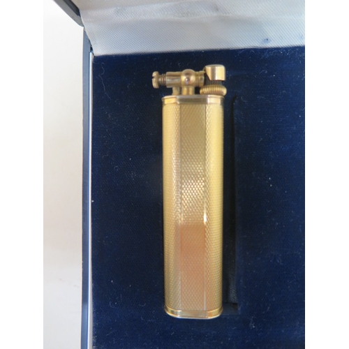 171 - A 9ct gold Dunhill lighter - boxed - approx weight 31.6 grams