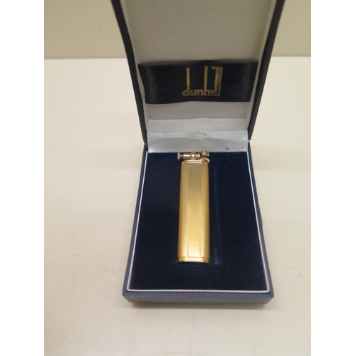 171 - A 9ct gold Dunhill lighter - boxed - approx weight 31.6 grams