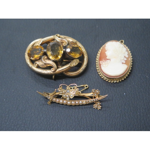 177 - A 9ct yellow gold and citrine brooch - approx 5cm - weight approx 11.8 grams - together with a 9ct y... 