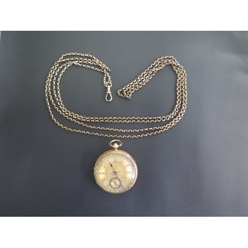 251 - An 18ct gold pocket watch with its key and case - Not working - and a gold plated chain