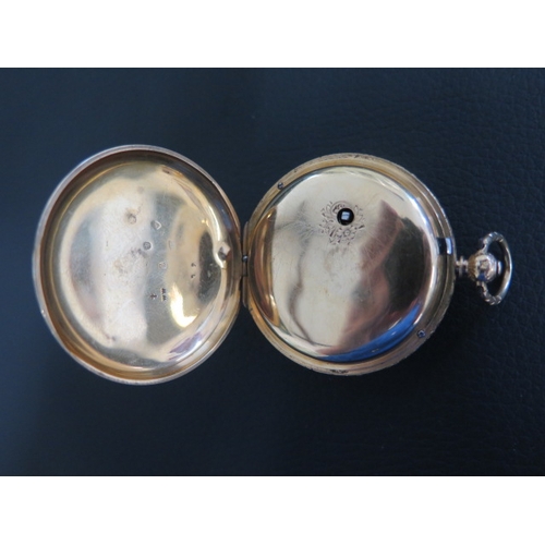 251 - An 18ct gold pocket watch with its key and case - Not working - and a gold plated chain