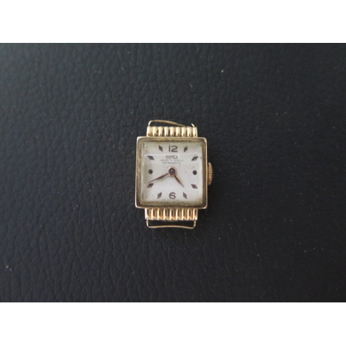 251A - A 1940's/50's ladies 18ct yellow gold cased Ramex wristwatch - seen working - rectangular case appro... 