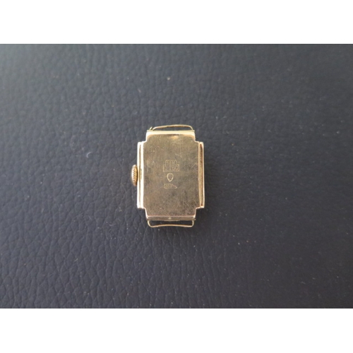 251A - A 1940's/50's ladies 18ct yellow gold cased Ramex wristwatch - seen working - rectangular case appro... 