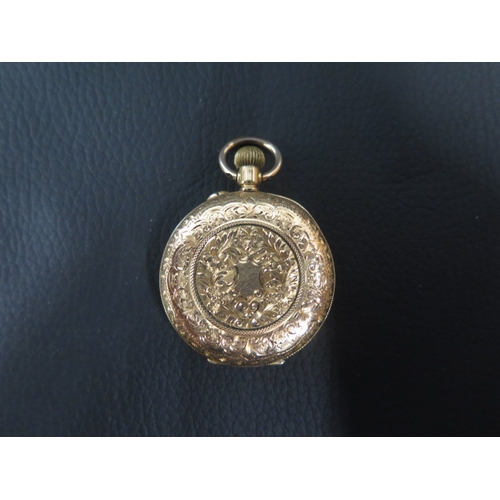 253 - An 18ct yellow gold cased fob watch, finely engraved case - approx 33mm