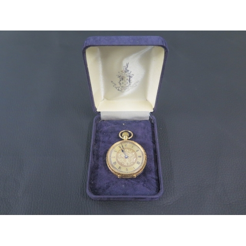 253 - An 18ct yellow gold cased fob watch, finely engraved case - approx 33mm