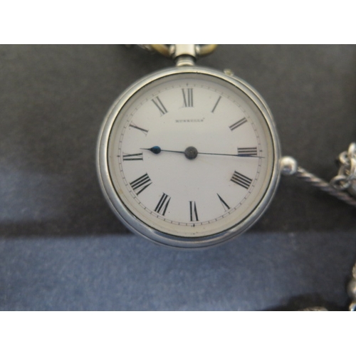 254 - A Russells silver cased fob watch approx 4cm - together with a good silver watch chain