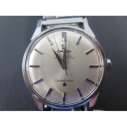 268 - An Omega Constellation automatic wristwatch - steel case approx 33mm - generic steel elastic strap -... 