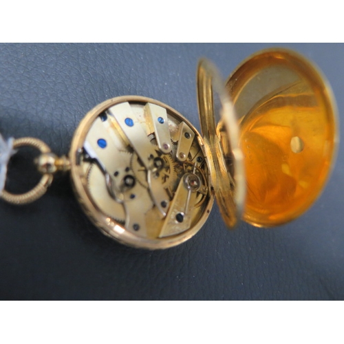 273 - A French 18ct yellow gold fob watch, finely chased - approx 3.5cm - weight approx 30 grams