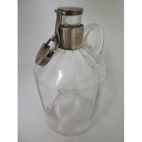 289 - A silver topped spirit bottle with a padlock - no key - hallmark maker JTH Birmingham 1904/05