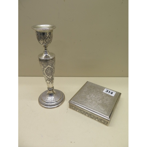 314 - A Middle Eastern silver candlestick - approx 20cm - weight approx 6.3 troy oz - together with a Midd... 