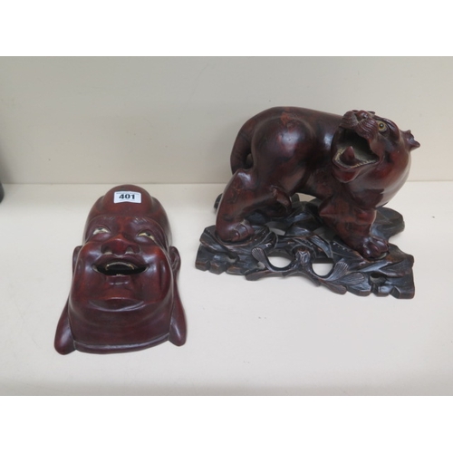 401 - A Chinese carved wood figure of Tiger approx 19cm on matching carved wood stand together with a carv... 