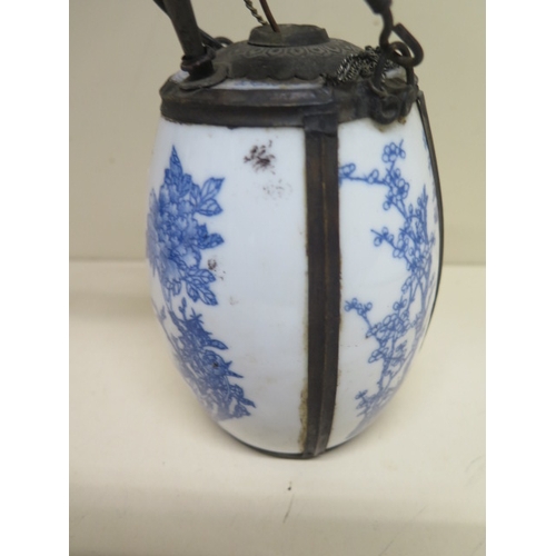 406 - An  Chinese blue and white opium pipe removed from a local house clearance - normal wear and tear fo... 