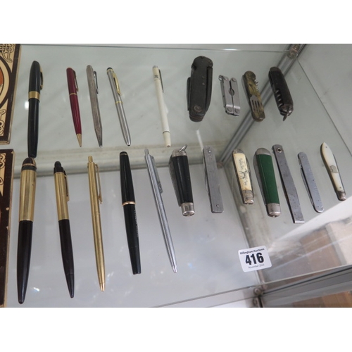 416 - Ten vintage pens and 11 vintage penknives