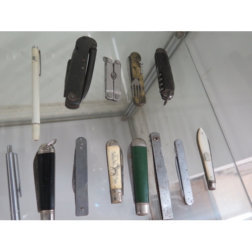 416 - Ten vintage pens and 11 vintage penknives