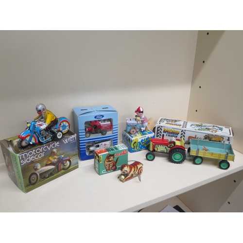 453 - Assorted clockwork toys, all working and boxed and a boxed set of Corgi vans