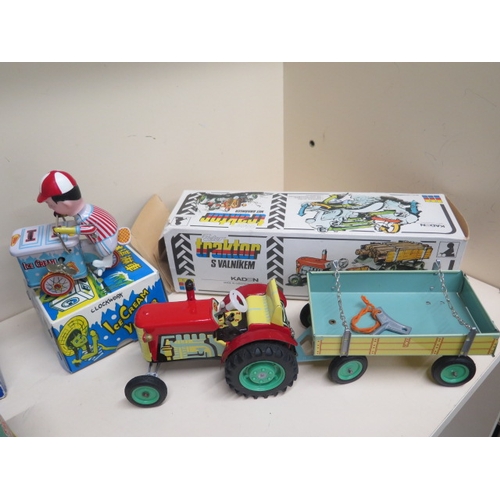 453 - Assorted clockwork toys, all working and boxed and a boxed set of Corgi vans