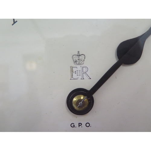 493 - A 10inch dial fusee movement G.P.O wall clock with crown on dial - working with pendulum and dial