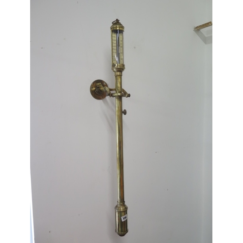 496 - A brass ships barometer - approx 95cm - with fixed brass  wall mount