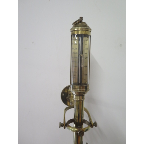 496 - A brass ships barometer - approx 95cm - with fixed brass  wall mount