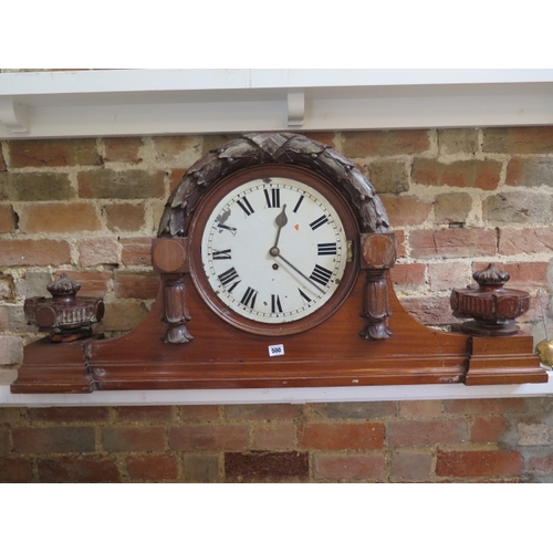 500 - A shop display clock with a painted dial and single fusee movement in a mahogany case - Width 117cm ... 