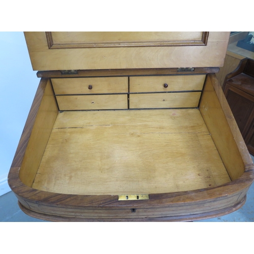 504 - A 19th century walnut and inlaid Davenport with a fitted interior and four drawers