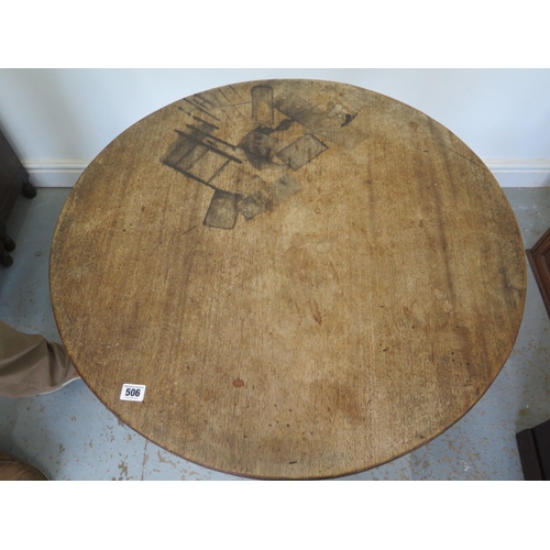 506 - A 19th century mahogany tripod table with a 78cm diameter top