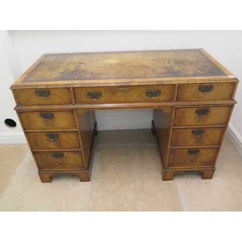 509 - A good quality late 19th century walnut nine drawer knee hole desk with a leather inset top - Width ... 