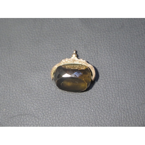 53 - A good quality smokey quartz fob in a good qaulity mount stamped 9ct