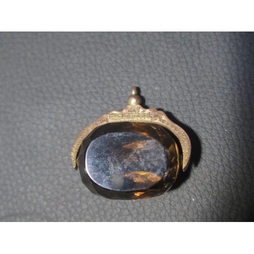 53 - A good quality smokey quartz fob in a good qaulity mount stamped 9ct