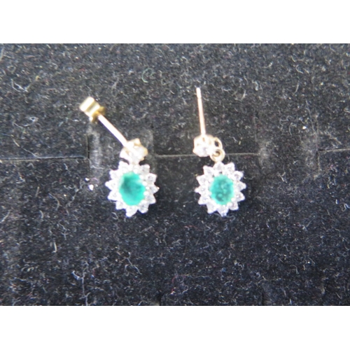 55 - Two pairs of 9ct gold earrings with ruby and emerald - weight approx 3.7 grams - 9ct white gold drop... 