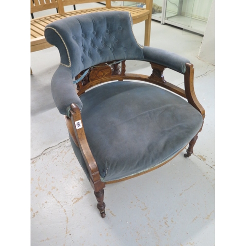 554 - A Victorian mahogany button back tub chair