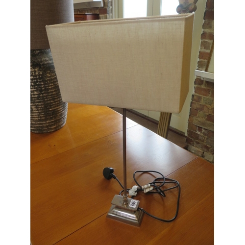 555 - A chromium plated table lamp with shade