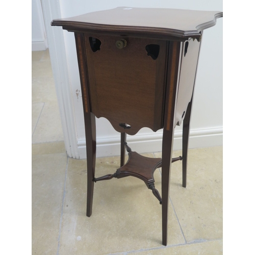 568 - An Edwardian mahogany stand - 73cm x 38cm