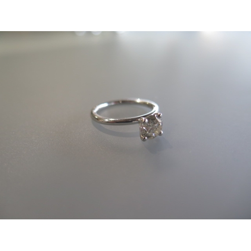 58 - A diamond solitaire ring size M/N - diamond weight 1.02ct - stamped 14ct with AIG certificate - appr... 