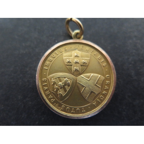 76 - A Victorian 12ct yellow gold winners medal 'Paruis Imbutus Tentabis Grandia Tutus' '1898 Victor Ludo... 