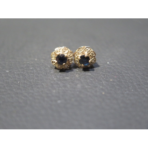 85 - A pair of 18ct yellow gold earrings (unmarked but tested) round approx 8mm - weight approx 4.7 grams... 