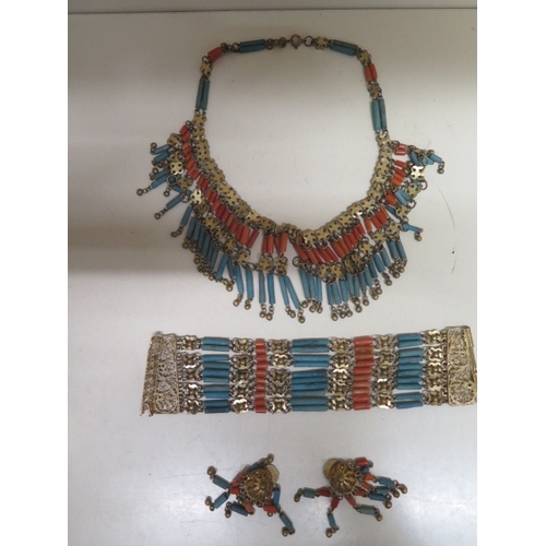 96 - An Egyptian bracelet, necklace and earrings