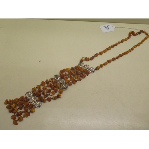 189 - An amber necklace - approx weight 57 grams