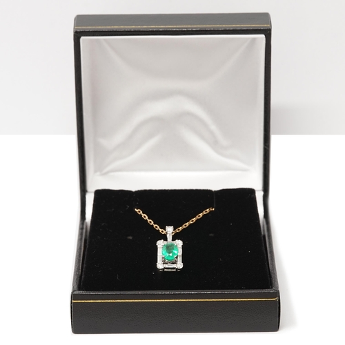 102 - A certificated stylish 18ct white gold oval-cut emerald and diamond pendant on an 18ct rose gold cha... 