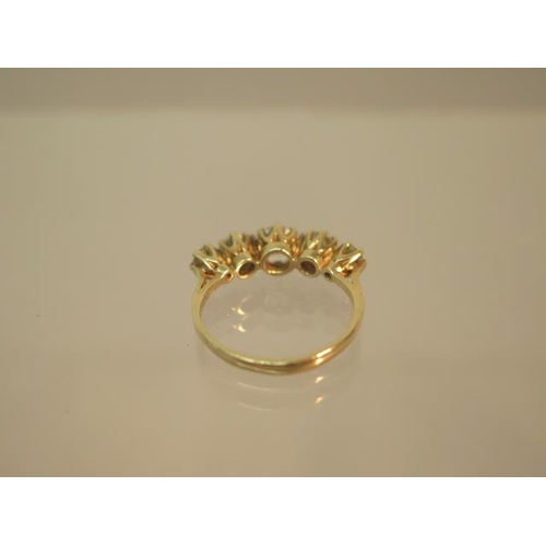 107 - A 9ct yellow gold (hallmarked) five stone ring with CZ - ring size O - weight approx 3 grams