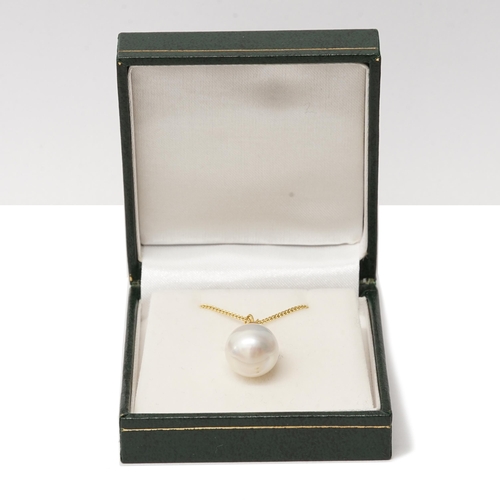 117 - A large 9ct yellow gold cultured pearl and citrine pendant on a gold-plated silver chain