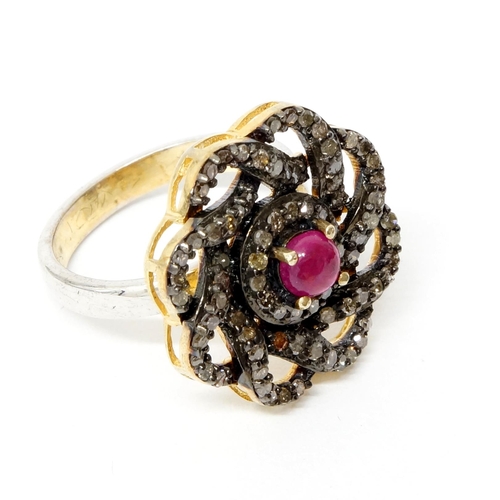 122 - A silver gilt dress ring set with a cabochon ruby and rose-cut diamonds - Diamonds 0.93ct - Ruby 0.6... 