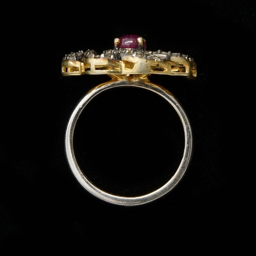 122 - A silver gilt dress ring set with a cabochon ruby and rose-cut diamonds - Diamonds 0.93ct - Ruby 0.6... 